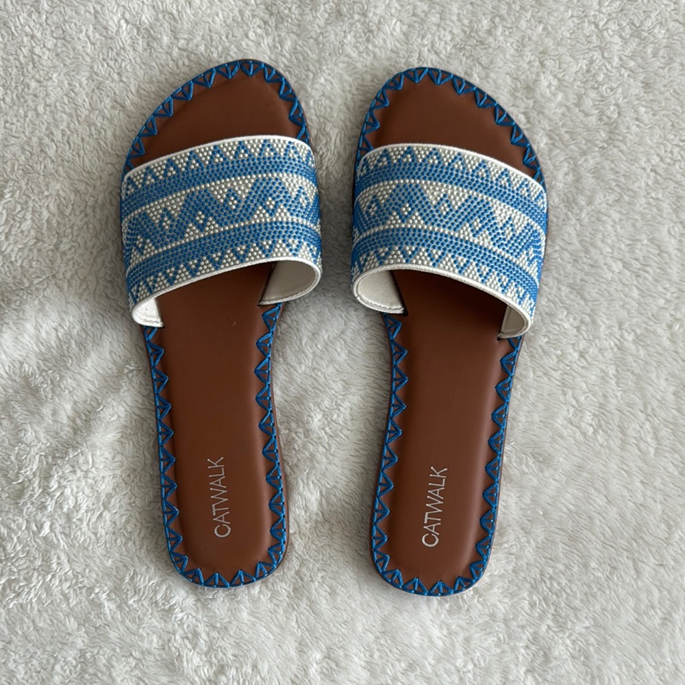 Blue and white slippers